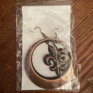 Saint earrings brand new